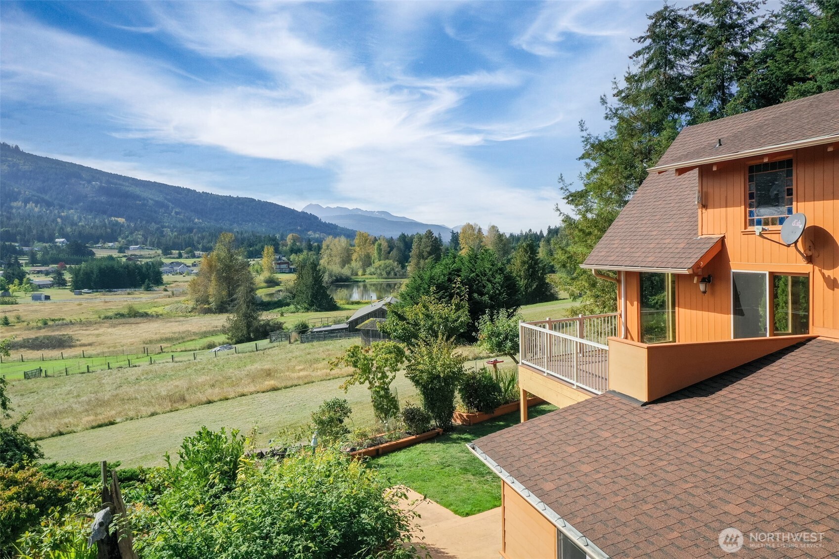 453 Stampede Drive Sequim, WA 98382 - Photo 4 of 36 a view of a house with a yard