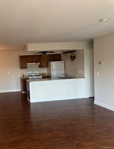 a view of kitchen and microwave