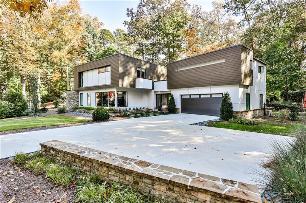 1495 Ragley Hall Road Northeast Brookhaven, GA 30319 - Photo 1 of 1 Completely gutted and rebuilt from the studs, this gorgeous contemporary in Brookhaven's Cambridge Park is a showstopper.