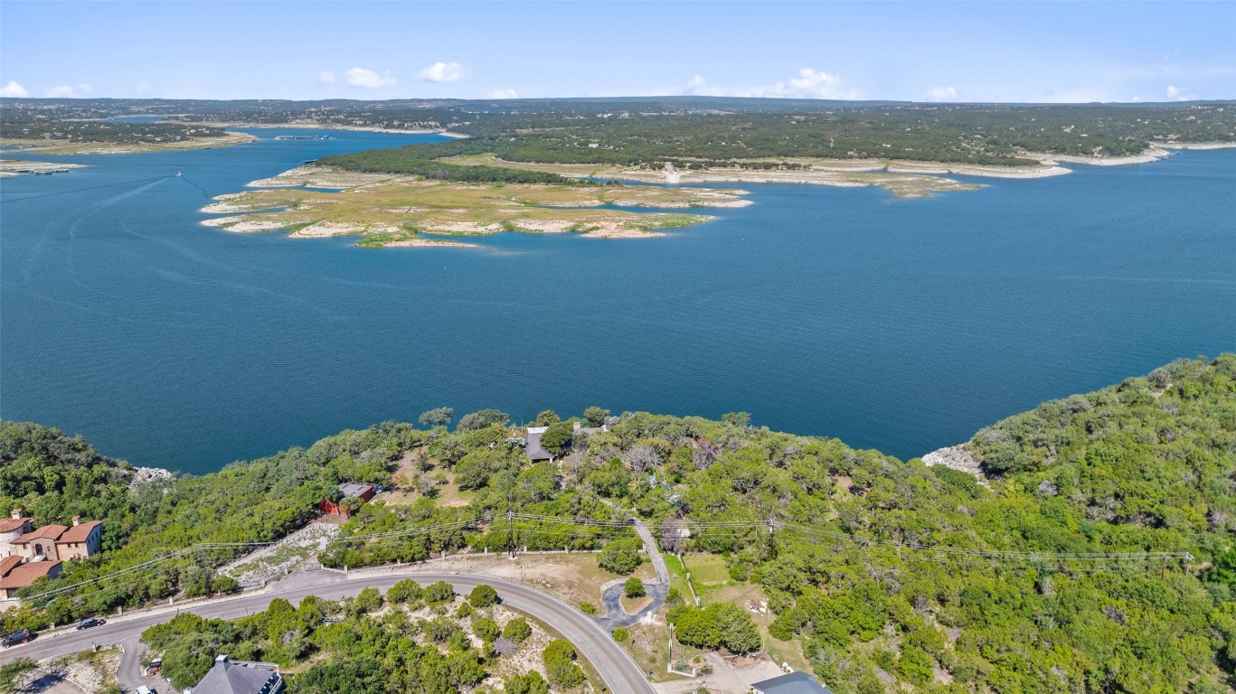 a view of an ocean and a mountain