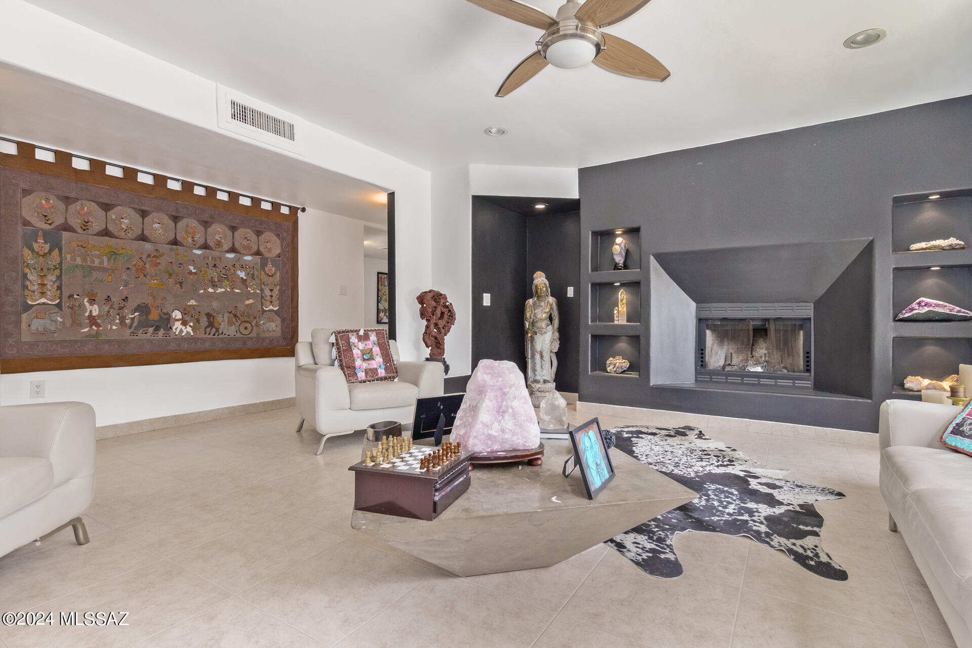 1242 Dodo Court Rio Rico, AZ 85648 - Photo 11 of 46 a living room with furniture and a fireplace