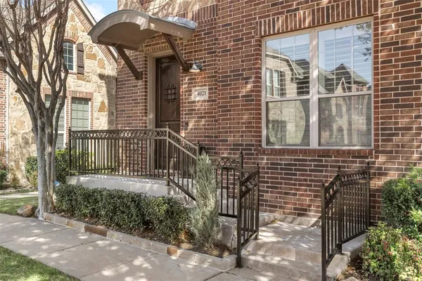 a front view of a house with a glass door