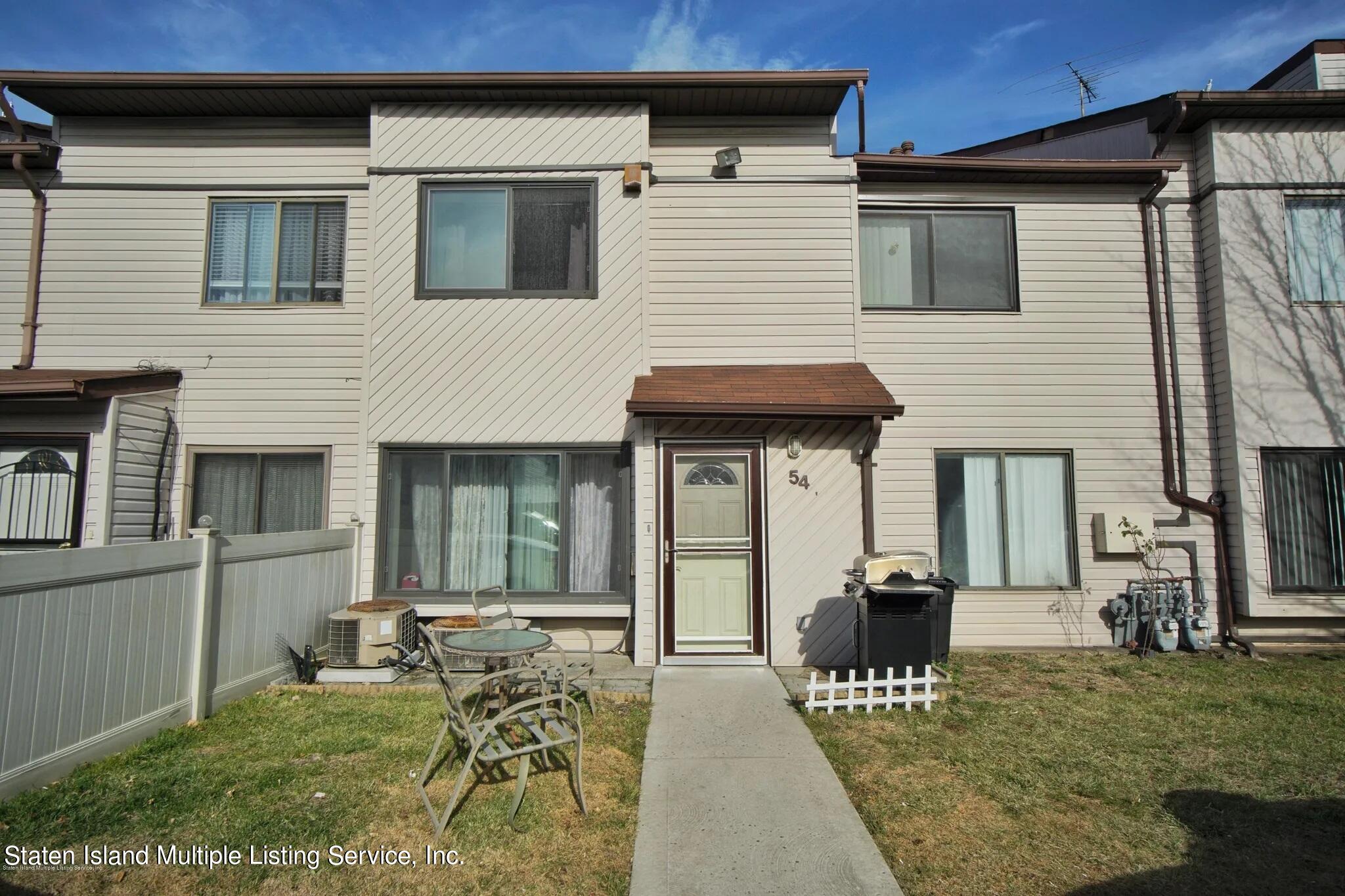 a house view with a sitting space