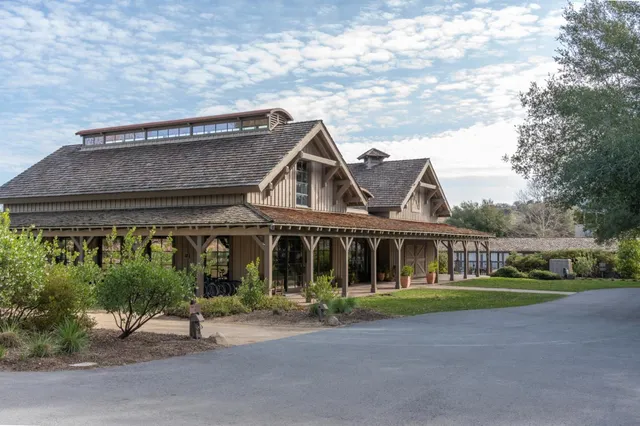 a view of a house with swimming pool