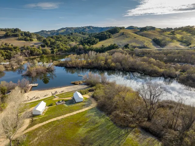 a front view of a building with garden
