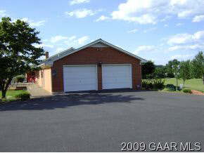 3085 Hermitage Road Waynesboro, VA 22980 - Photo 3 of 12 a view of a house with a yard and garage