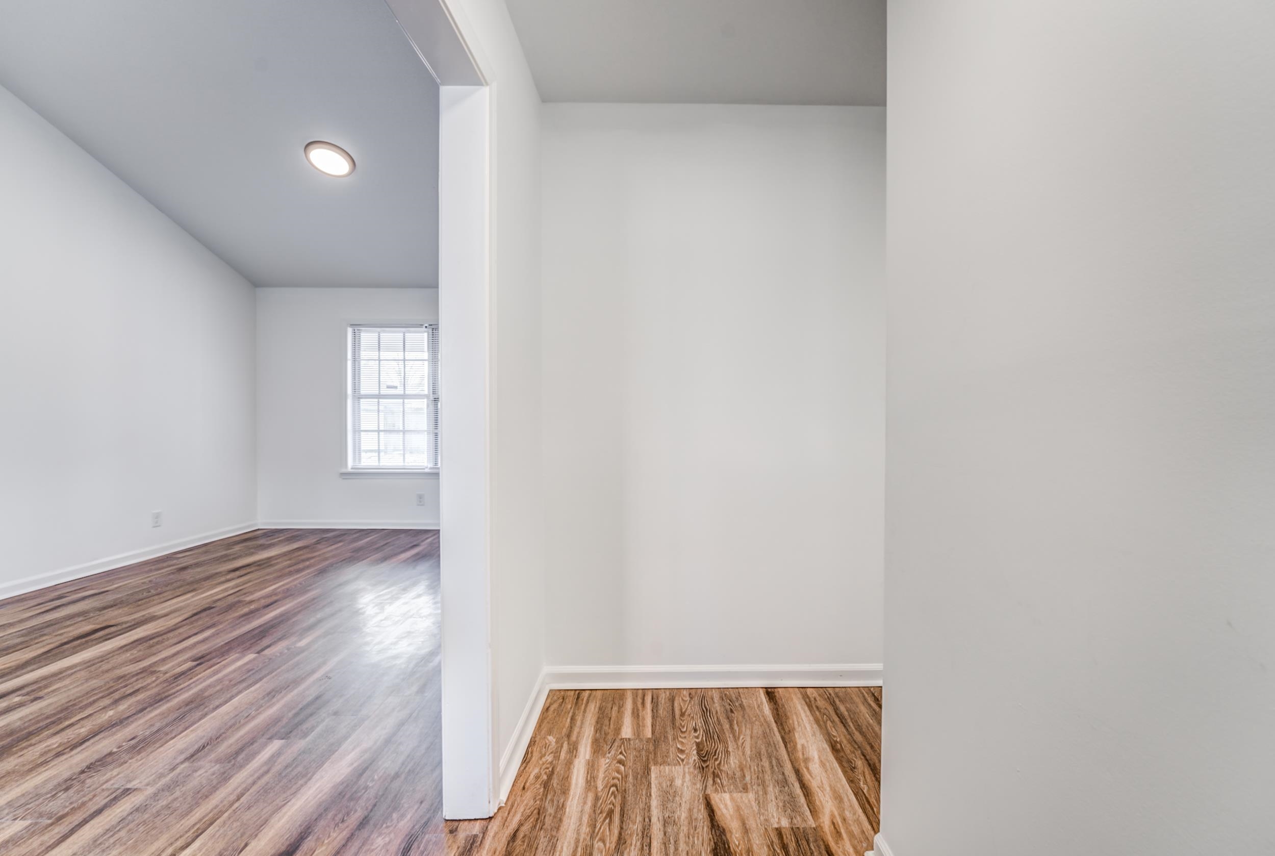 3563 Clarke Road Memphis, TN 38115 - Photo 3 of 39 Empty room with wood finished floors