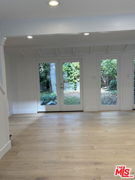 643 Hightree Road Santa Monica, CA 90402 - Photo 14 of 25 an empty room with windows