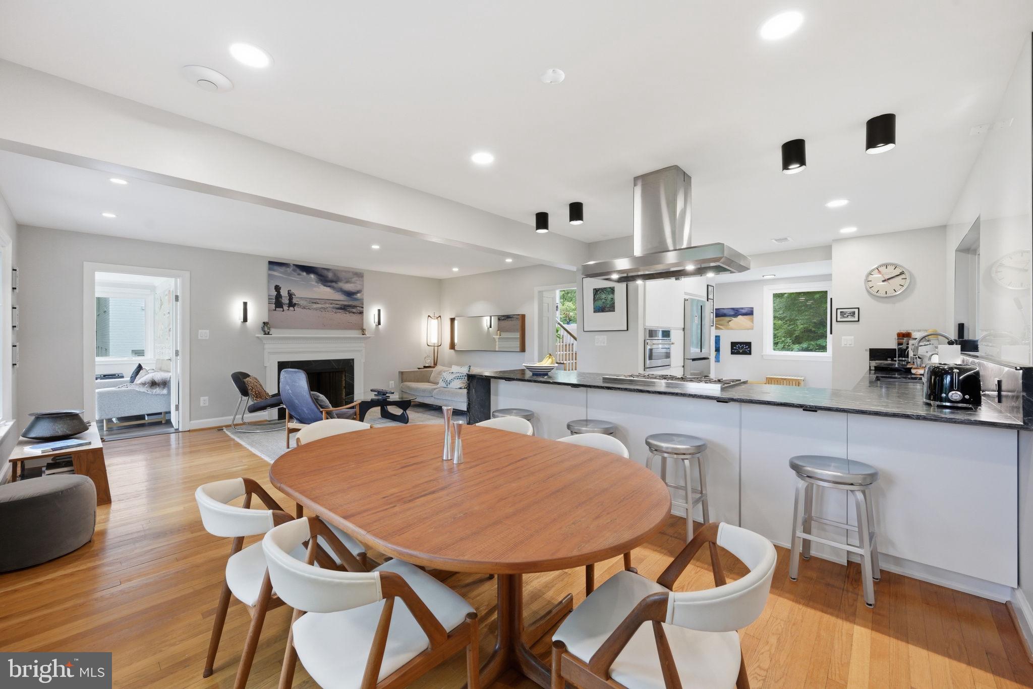 2829 29th Place Northwest Washington, DC 20008 - Photo 9 of 41 a large kitchen with a table and chairs