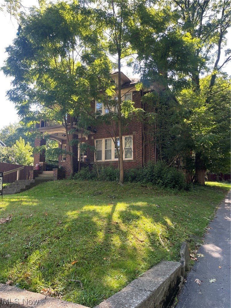 3222 Oak Road Cleveland, OH 44118 - Photo 1 of 13 View of front of property featuring a front yard
