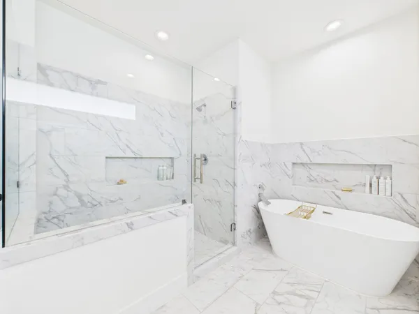 a bathroom with a bathtub and a sink