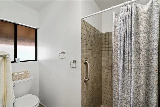 a bedroom with a bed and furniture