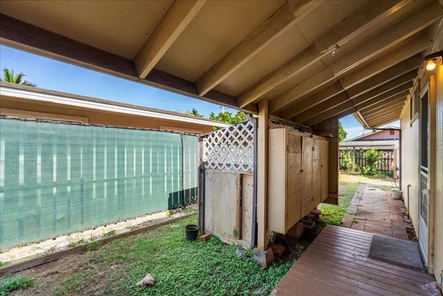 a view of a house with a snow in the yard