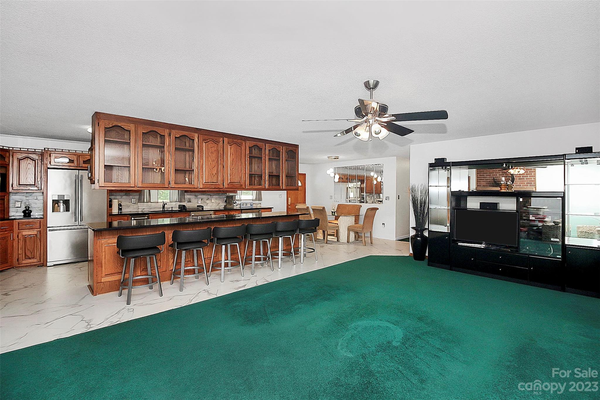 870 Bridle Path Fort Mill, SC 29708 - Photo 20 of 34 a living room with lots of furniture and a kitchen view