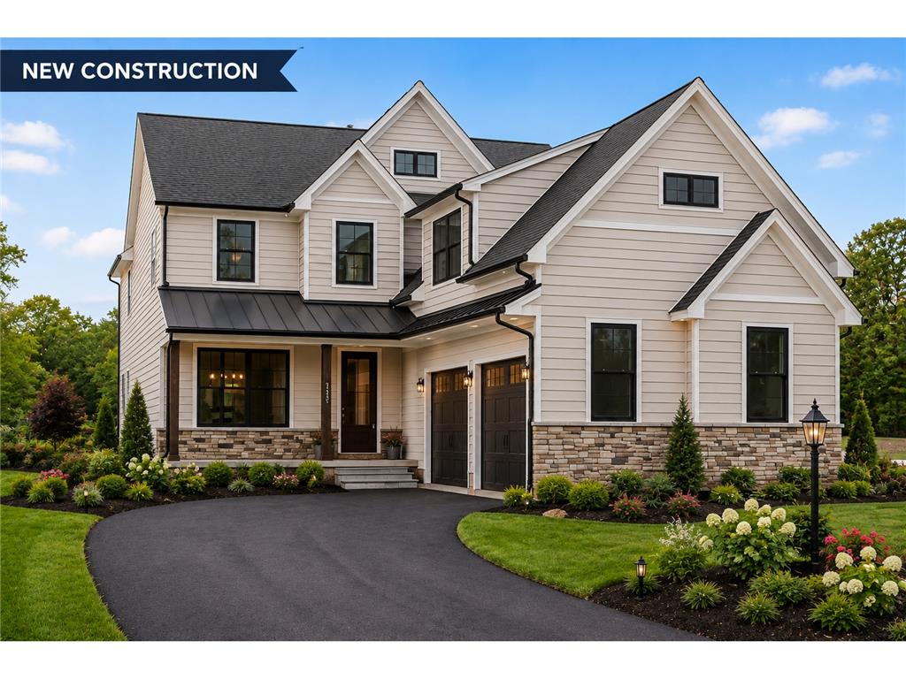 Hottle Road Quakertown, PA 18951 - Photo 1 of 59 An asphalt driveway leads past manicured landscaping to a two-story home clad in siding and stone. Landscape is generated.