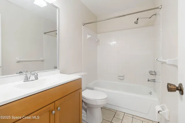 a bathroom with a sink a toilet and a bathtub