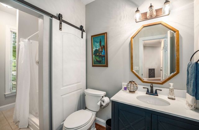 a view of a chairs and table on the wooden floor