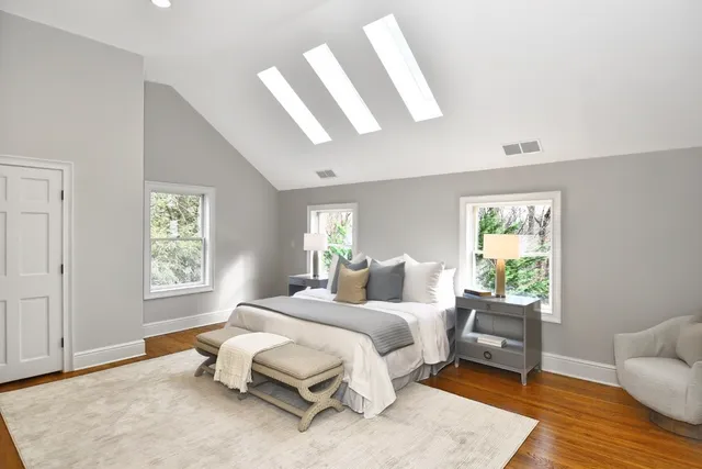 a bed room with a bed and a couch