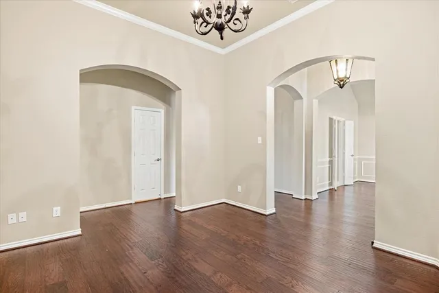 a view of an entryway with wooden floor