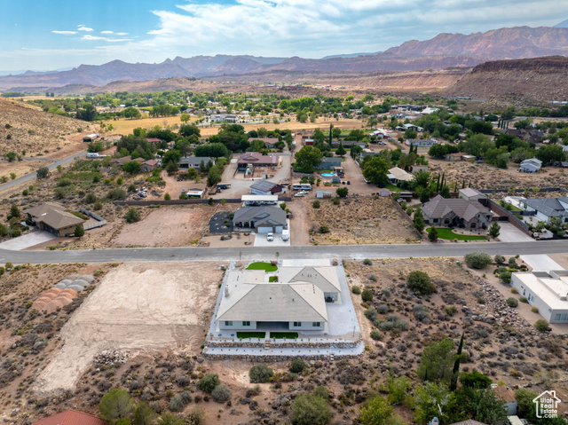 230 Boulder Way Leeds, UT 84746 - Photo 56 of 72 Aerial perspective of suburban area with mountains and a desert landscape