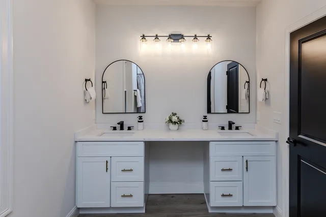 a bathroom with a shower a toilet and a shower