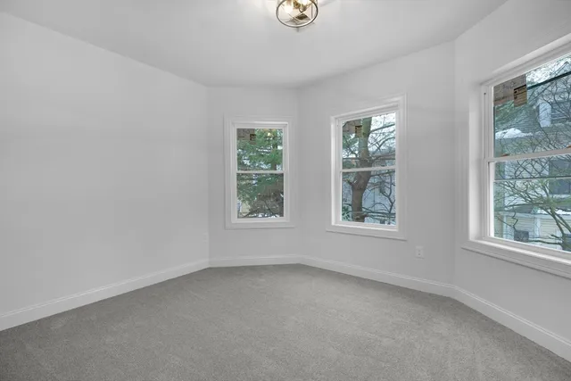 a front view of a house with yard