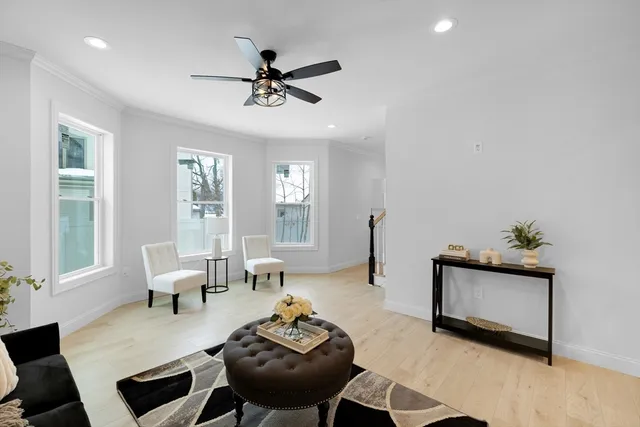 a view of a livingroom with furniture and window