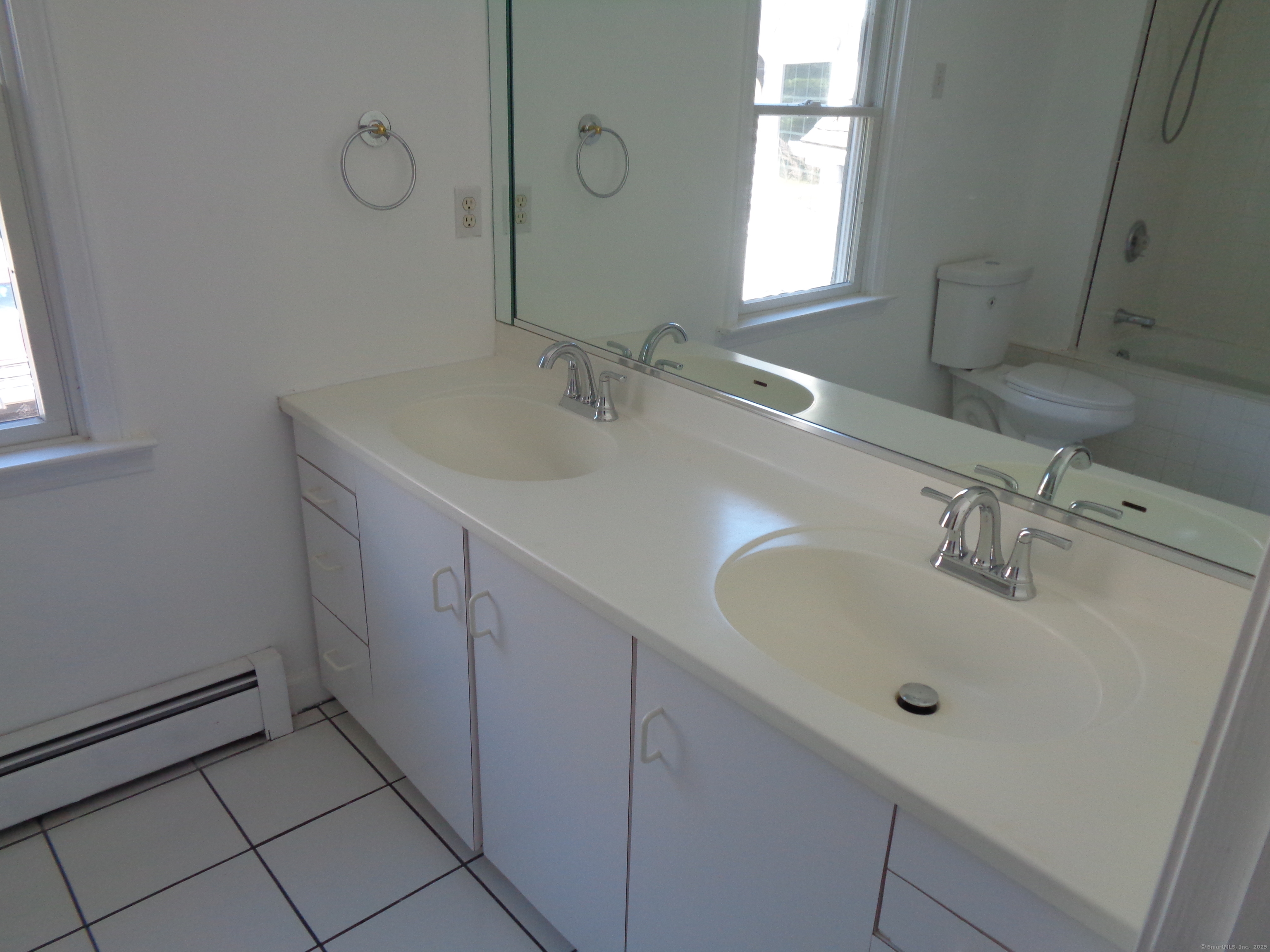 531 Hollow Tree Ridge Road Darien, CT 06820 - Photo 20 of 37 a bathroom with a sink and a vanity