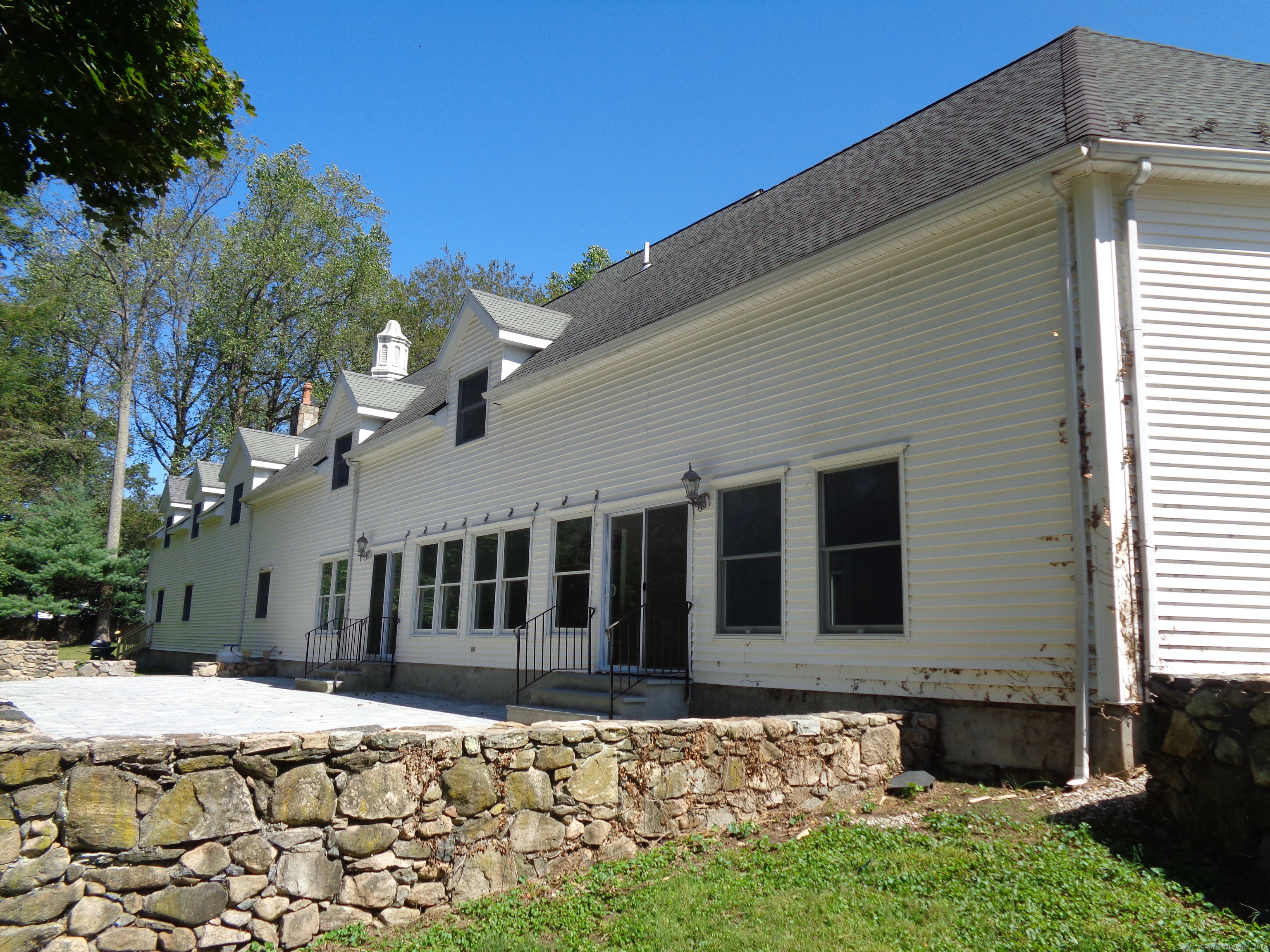 531 Hollow Tree Ridge Road Darien, CT 06820 - Photo 3 of 37 a view of a house with a yard