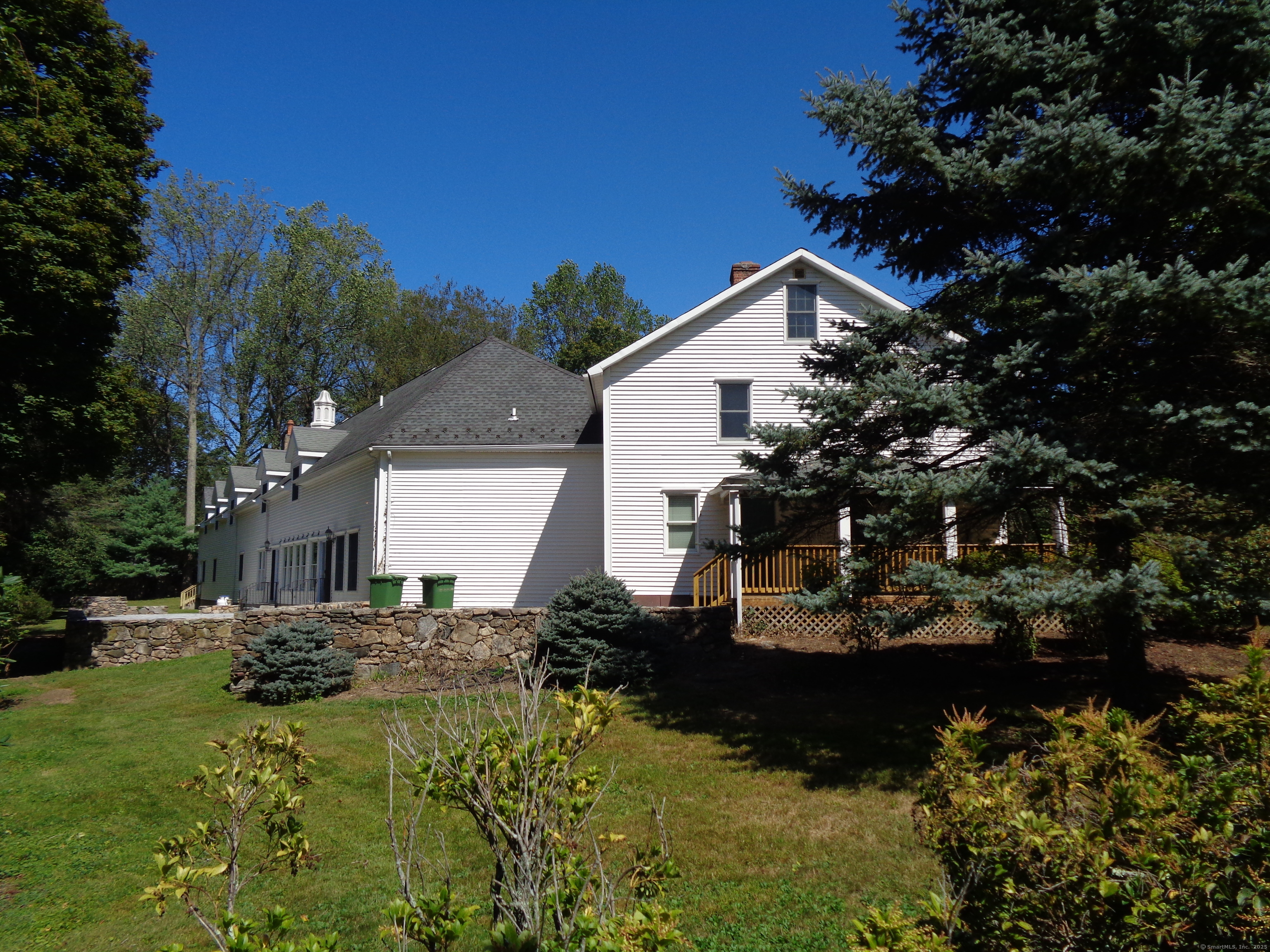 531 Hollow Tree Ridge Road Darien, CT 06820 - Photo 35 of 37 a view of a house with a yard