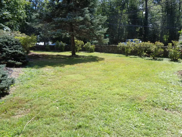 a view of deck with wooden floor and seating space