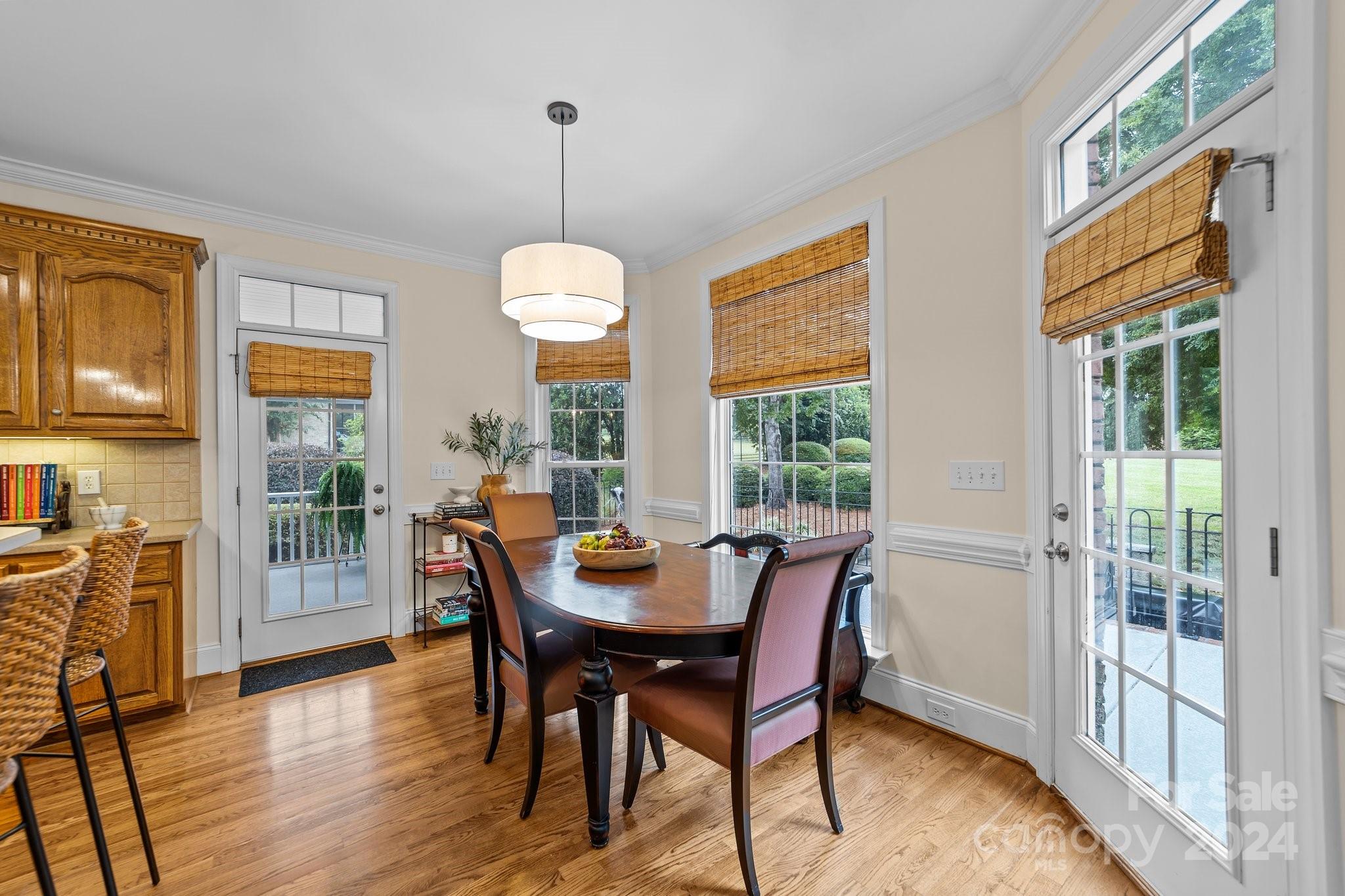 6370 Chamar Circle Kannapolis, NC 28081 - Photo 13 of 48 a view of a dining room with furniture window and wooden floor