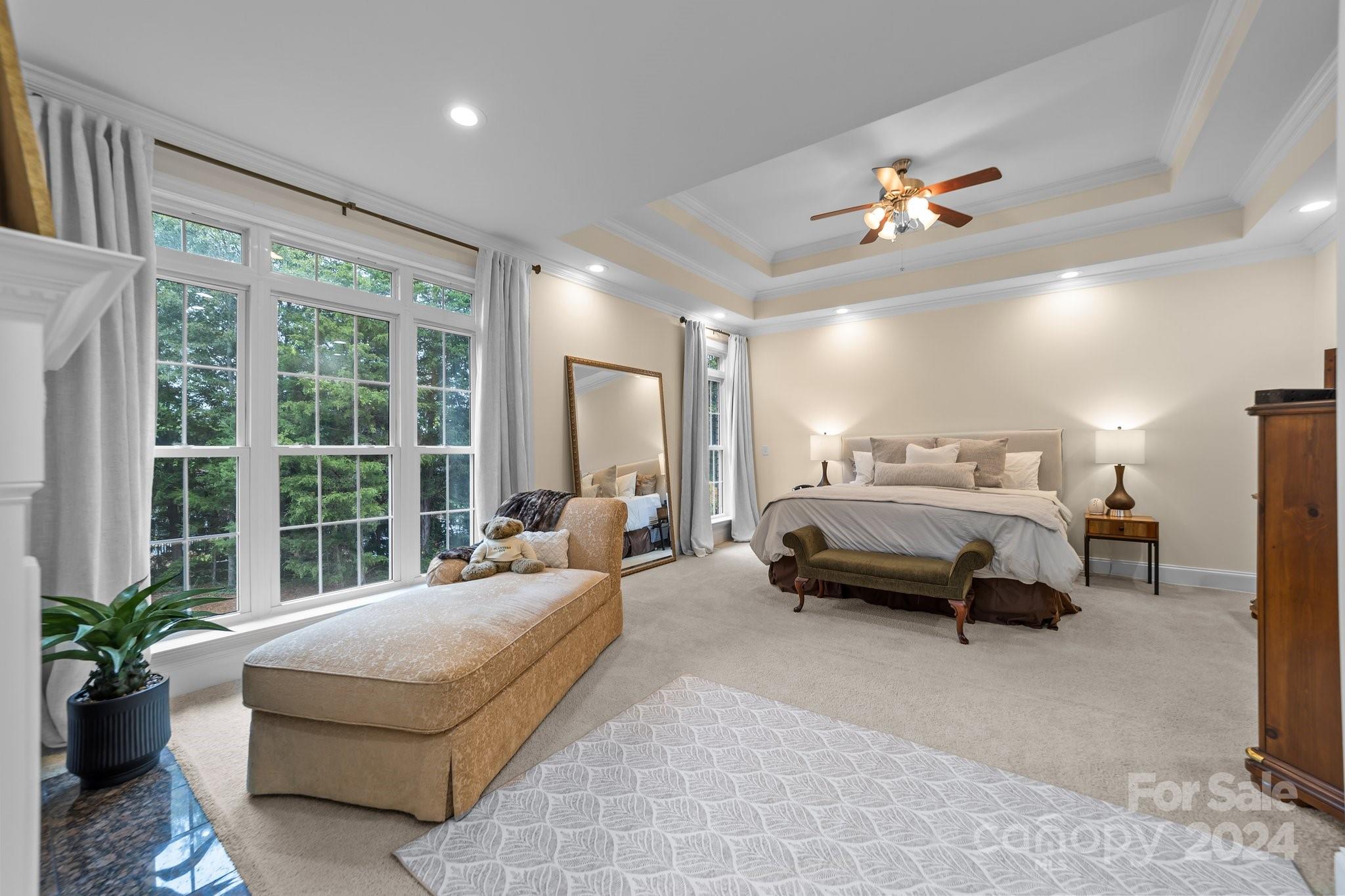 6370 Chamar Circle Kannapolis, NC 28081 - Photo 18 of 48 a spacious bedroom with a balcony a bed and glass walk in closet