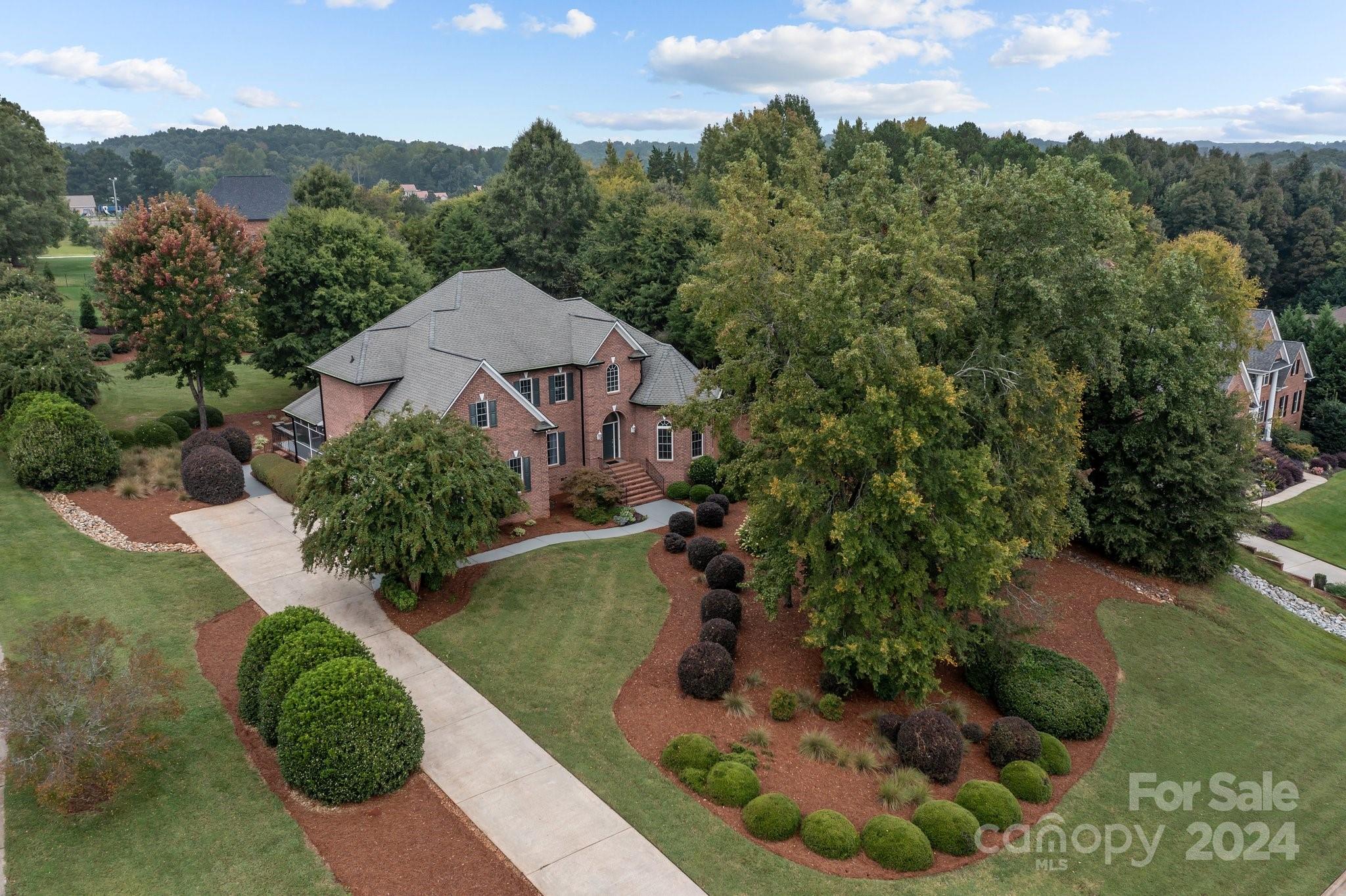6370 Chamar Circle Kannapolis, NC 28081 - Photo 2 of 48 a view of a garden with a house