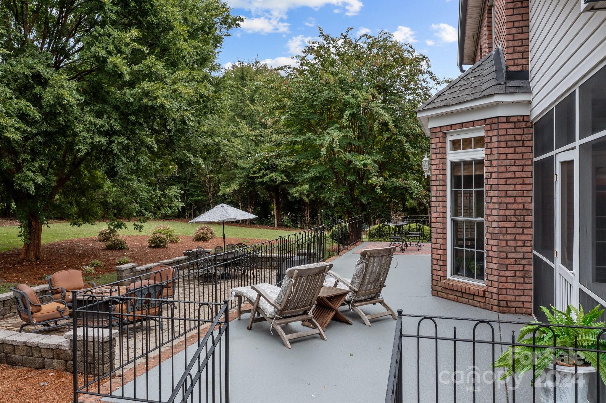 6370 Chamar Circle Kannapolis, NC 28081 - Photo 38 of 48 a view of a patio with chairs and potted plants