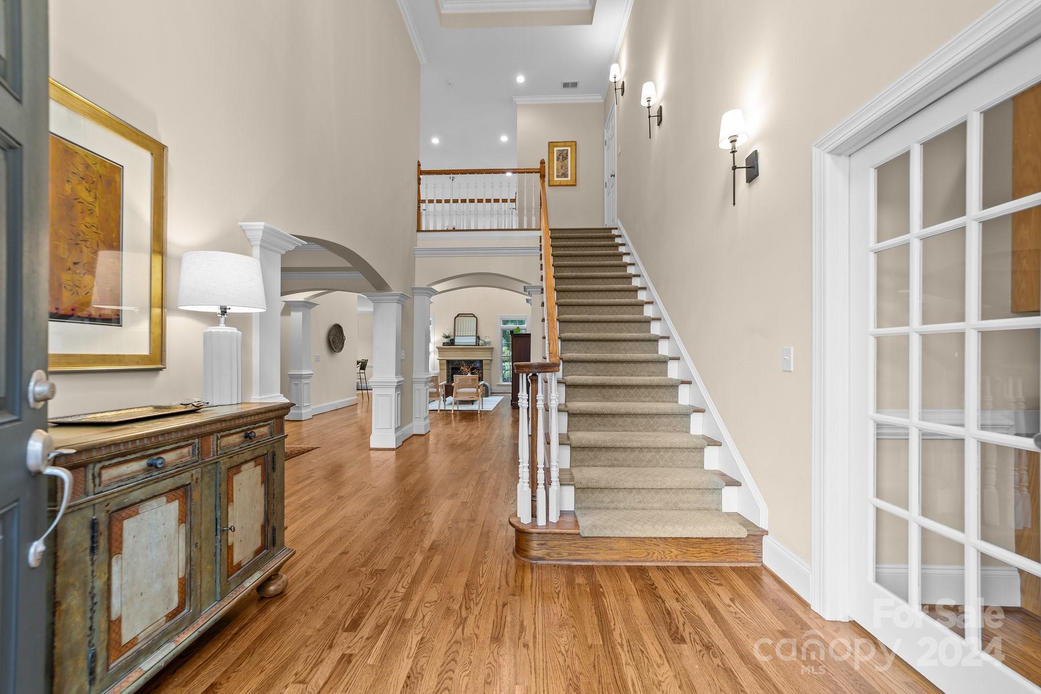 6370 Chamar Circle Kannapolis, NC 28081 - Photo 4 of 48 a view of a kitchen with wooden floor and staircase