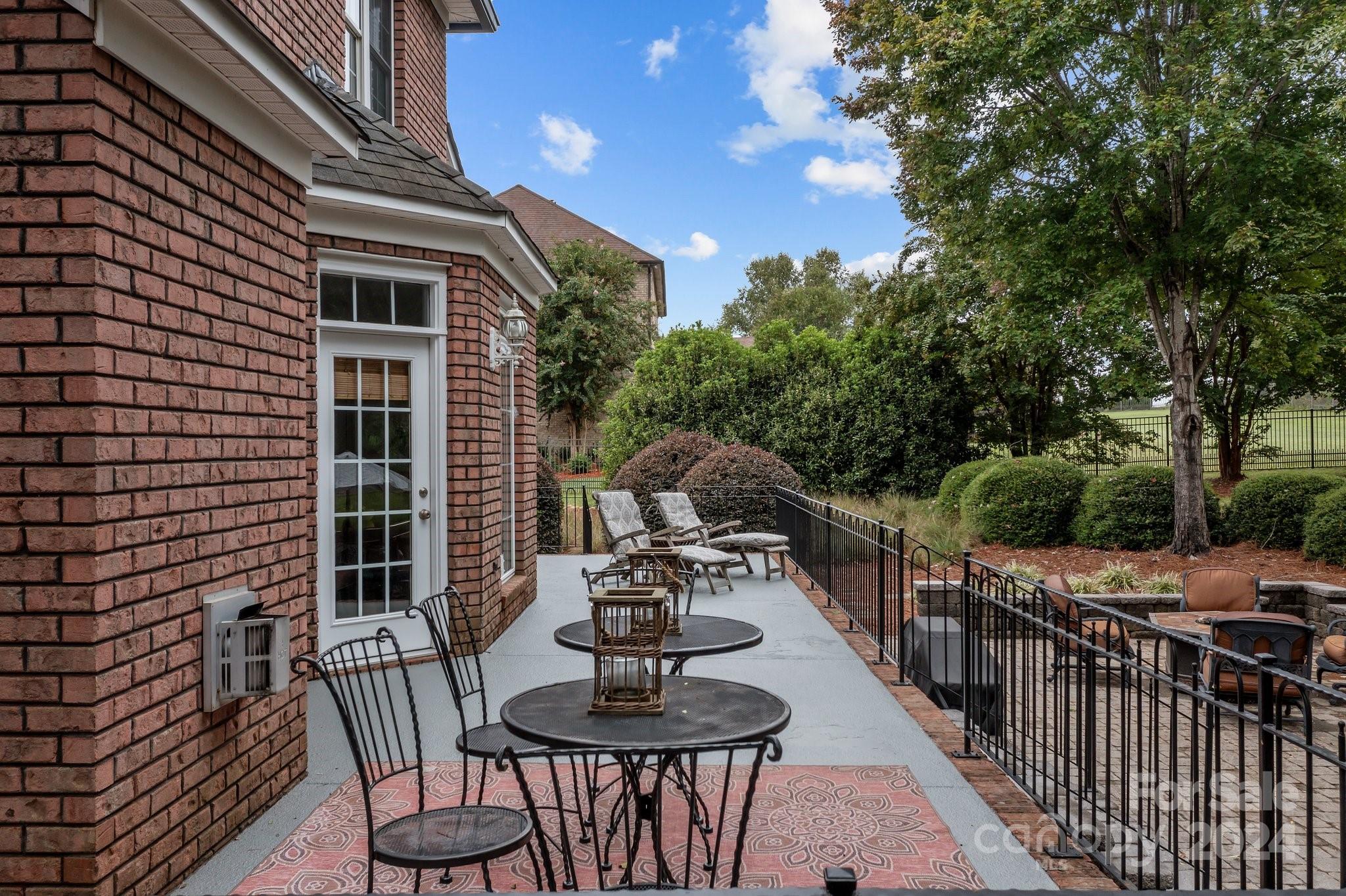 6370 Chamar Circle Kannapolis, NC 28081 - Photo 41 of 48 a view of a chair and tables in the balcony