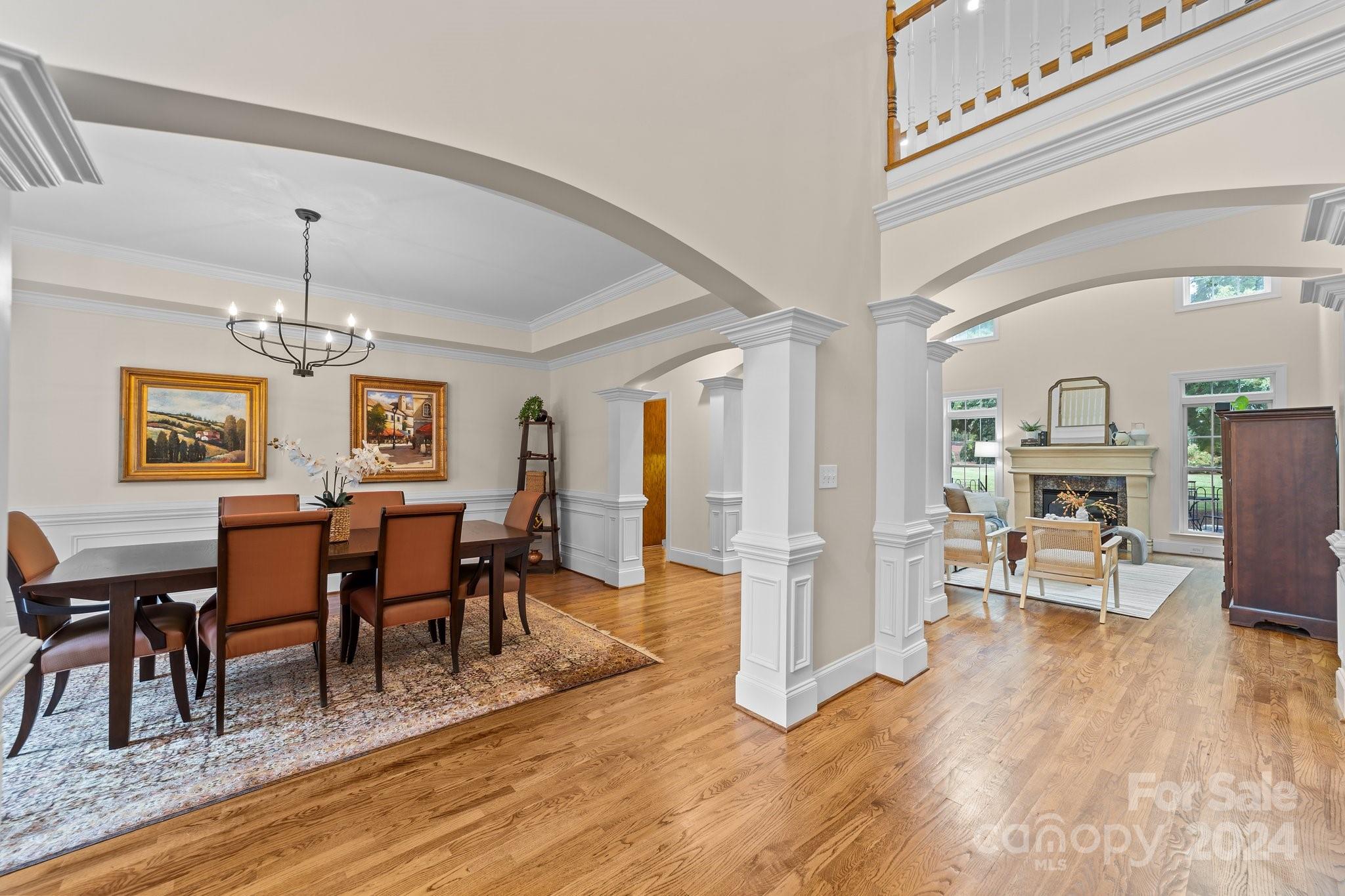 6370 Chamar Circle Kannapolis, NC 28081 - Photo 5 of 48 a view of a dining room with furniture and wooden floor
