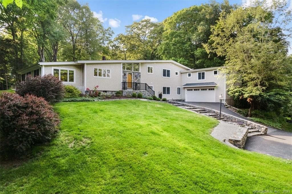 137 Horse Pond Road Madison, CT 06443 - Photo 1 of 1 Exterior front with lovely stone walls.