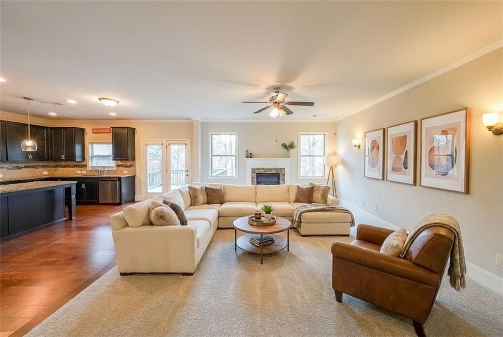 408 After Glow Summit Canton, GA 30114 - Photo 8 of 52 a living room with furniture and kitchen view