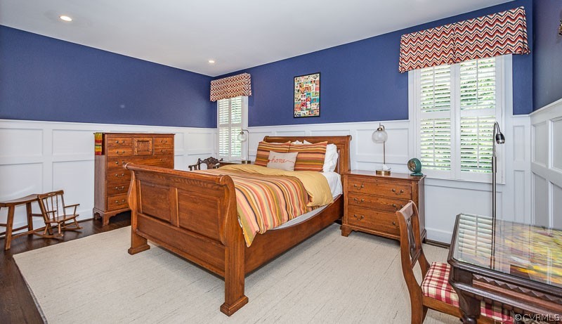 11624 Barrows Ridge Lane Chesterfield, VA 23838 - Photo 31 of 48 a bedroom with a bed and wooden floor