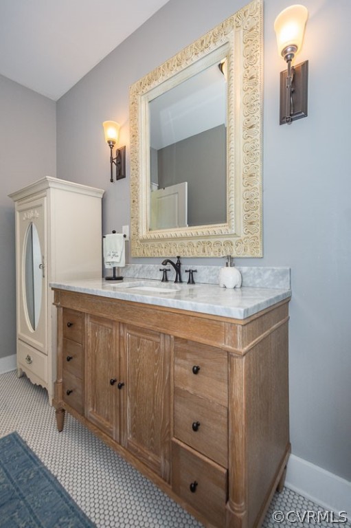 11624 Barrows Ridge Lane Chesterfield, VA 23838 - Photo 37 of 48 a bathroom with a sink double vanity and a mirror