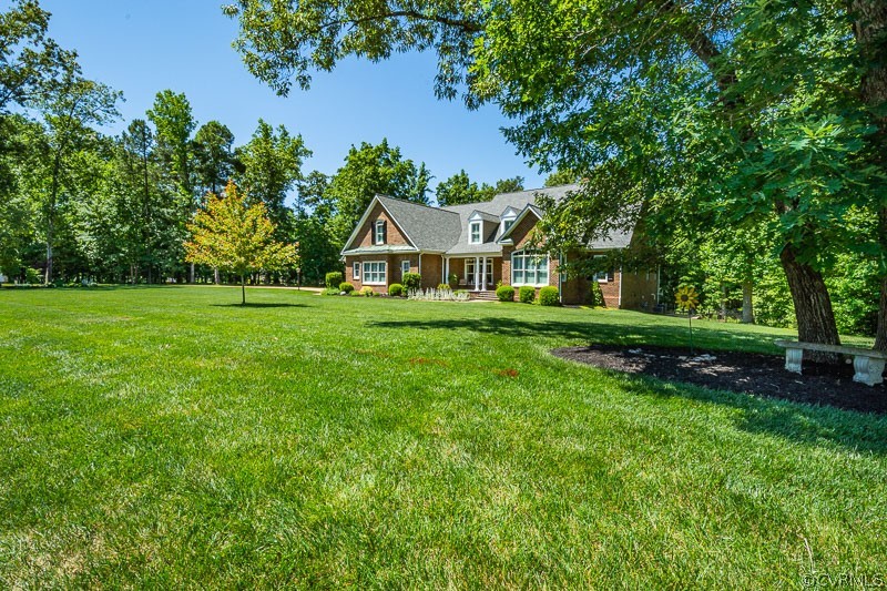 11624 Barrows Ridge Lane Chesterfield, VA 23838 - Photo 5 of 48 a front view of a house with a yard