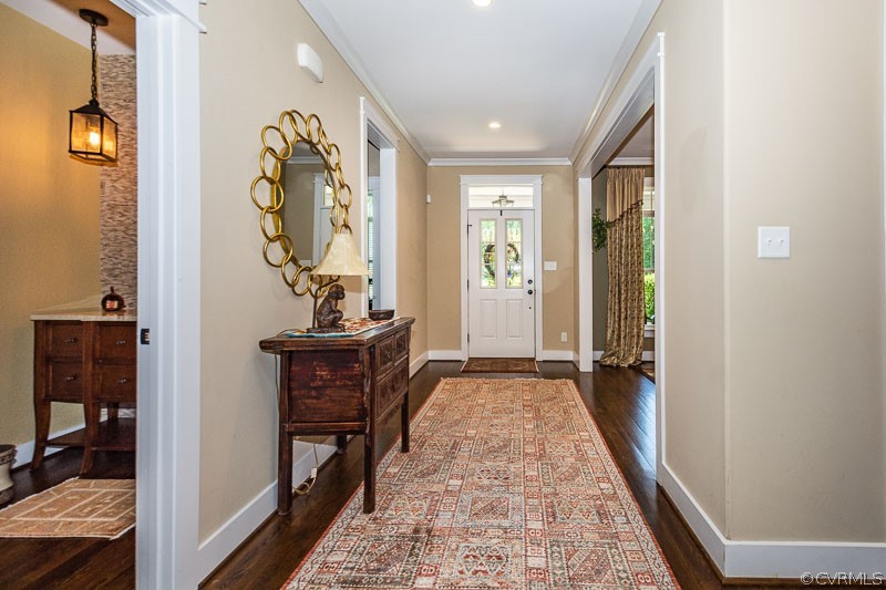 11624 Barrows Ridge Lane Chesterfield, VA 23838 - Photo 6 of 48 a view of a hallway to a livingroom with furniture