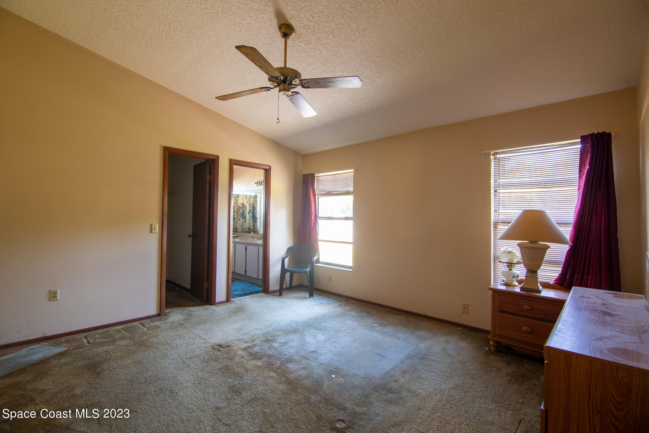 1816 Clover Circle Melbourne, FL 32935 - Photo 7 of 13 a view of an empty room with a window