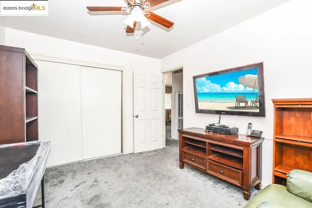 a bathroom with a sink mirror toilet and bathtub