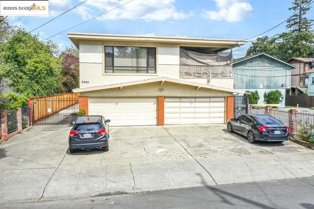 a car parked in front of a house