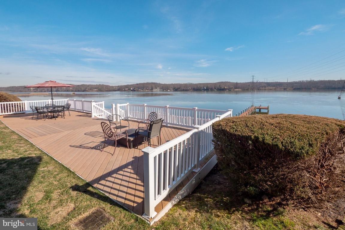 3100 Hemlock Point Court Triangle, VA 22172 - Photo 3 of 71 a view of a roof deck with couches and wooden floor