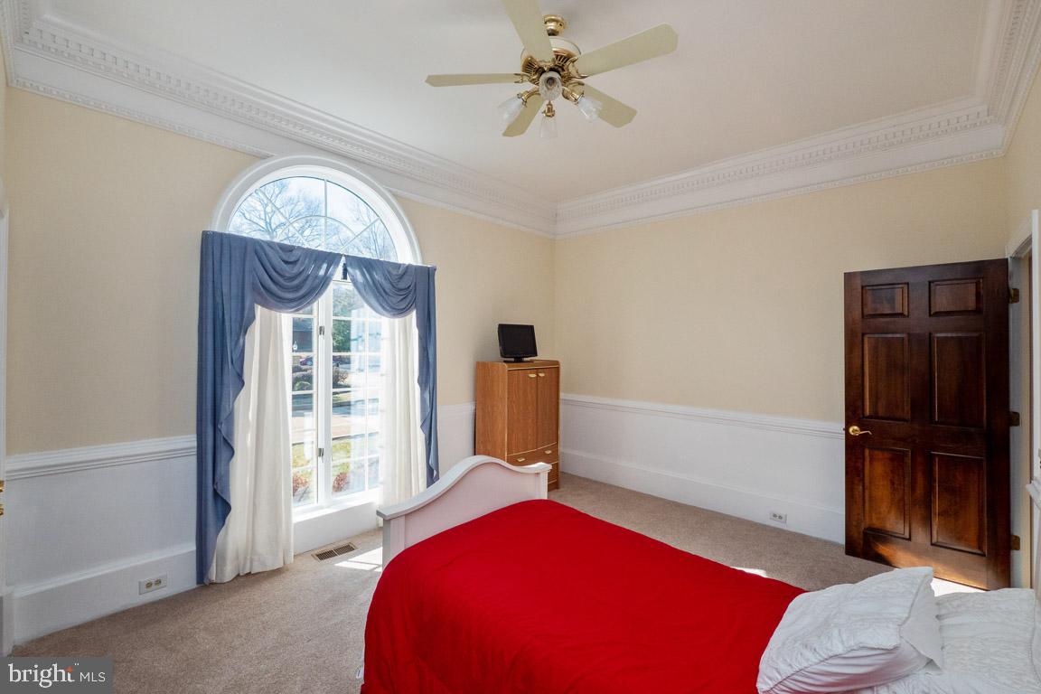 3100 Hemlock Point Court Triangle, VA 22172 - Photo 30 of 71 a bedroom with a bed and a window