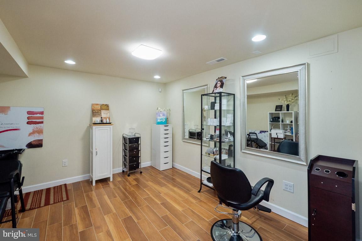 3100 Hemlock Point Court Triangle, VA 22172 - Photo 45 of 71 a view of a workspace with furniture and wooden floor